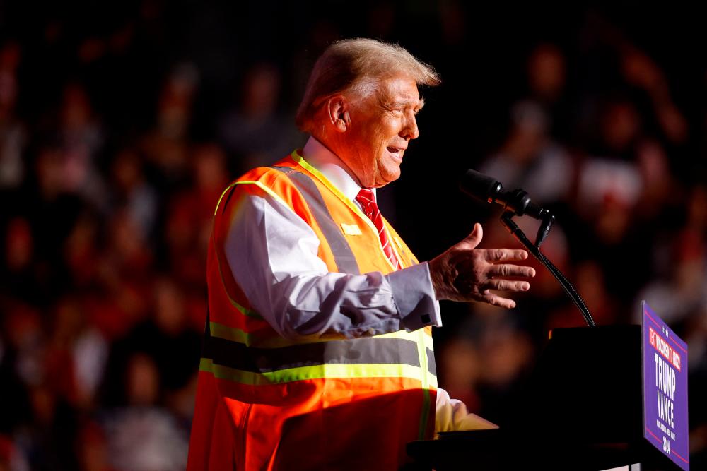 Republican presidential nominee, former President Donald Trump speaks during a campaign event at the Resch Center on October 30, 2024 in Green Bay, Wisconsin. With less than a week until Election Day, Trump continues to campaign in the battleground swing states. - Chip Somodevilla/Getty Images/AFP