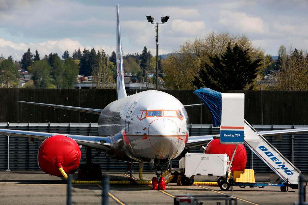 A Boeing 737 MAX 9 airliner is pictured on the flight line at the Boeing Renton Factory in Renton, Washginton on April 20, 2020. Orders for non-defence aircraft and parts fell last month, reflecting customers cancelling orders from the aerospace giant. – AFPPIX
