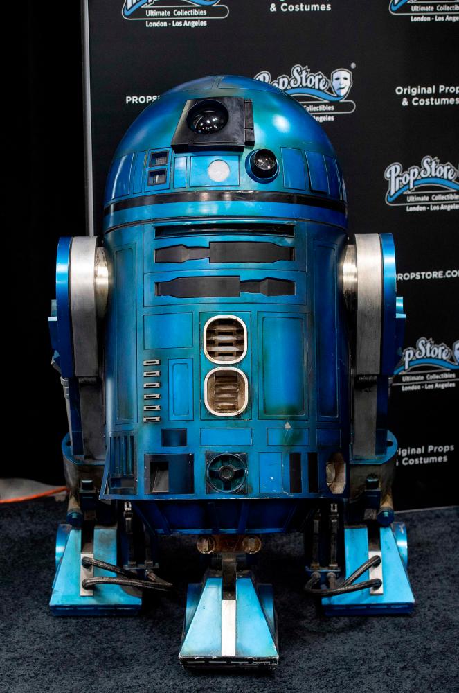 R2-SHP light-up remote control droid from Star Wars: The rise of Skywalker is exhibited during a press preview of Prop Store's Iconic Film &amp; TV Memorabilia on May 14, 2021, in Valencia, California. – AFP