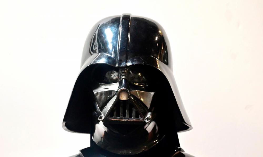 A Darth Vader helmet and mask from the film “The Empire Strikes Back” on display at the Profiles in History auction house on August 28, 2019 in Calabasas, California ahead of “The Icons and Legends of Hollywood Auction” on September 25 and 26. Darth Vader’s helmet from “The Empire Strikes Back” is among a vast collection of coveted Hollywood treasures going under the hammer next month, with experts predicting it could fetch nearly half-a-million dollars. / AFP / Frederic J. BROWN