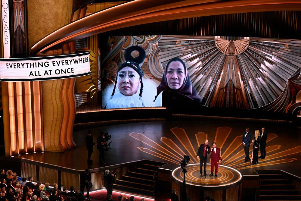 US director Daniel Scheinert (L) and US director Daniel Kwan accept the Oscar for Best Director for “Everything Everywhere All at Once” onstage during the 95th Annual Academy Awards at the Dolby Theatre in Hollywood, California on March 12, 2023. AFPPIX