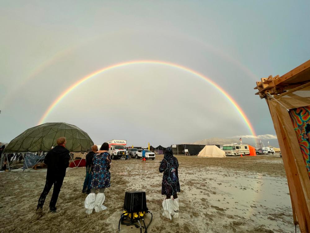 Desert rain leaves thousands stranded in muddy mess at Burning Man