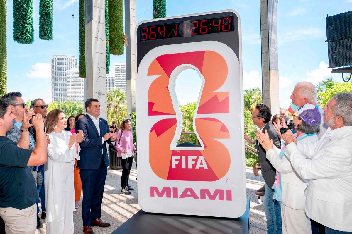 Beau Ferrari and Marc Anthony unveil the FIFA World Cup Miami Countdown Clock during the FIFA World Cup One Year Out Celebration at Perez Art Museum Miami on June 11, 2025 in Miami, Florida. AFP