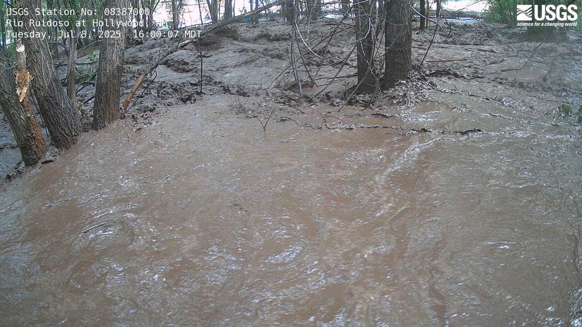 This United States Geological Survey (USGS) handout photo released by the Albuquerque National Weather Service via X (formerly Twitter) shows the flooded banks of the Ruidoso River near Ruidoso, New Mexico on July 8, 2025. (Photo by UNITED STATES GEOLOGICAL SURVEY / AFP)