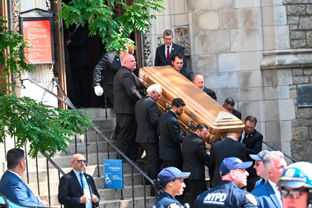 The casket of Ivana Trump is brought out of St. Vincent Ferrer Roman Catholic Church after her funeral July 20, 2022 in New York City/AFPPix