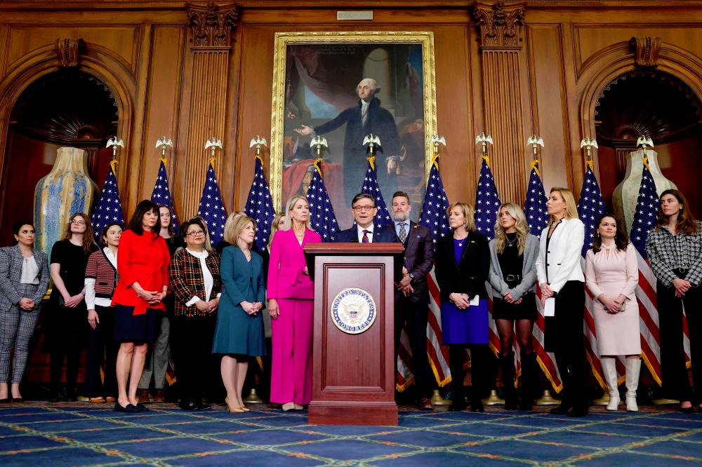 Speaker of the House Mike Johnson (R-LA) (C) speaks at a news conference following the House of Representatives vote on H.R. 28 - “Protection of Women and Girls in Sports Act” at the U.S. Capitol - AFPpix