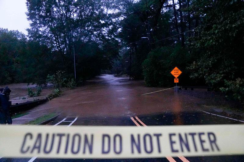 Floodwaters in the Buckhead neighborhood in the aftermath of Hurricane Helene on September 27, 2024 in Atlanta, Georgia. Hurricane Helene made landfall in Florida's Big Bend region as a category four hurricane, and has brought flooding inland as the storm system moves over Georgia, heading into the Carolinas. - Megan Varner/Getty Images/AFP