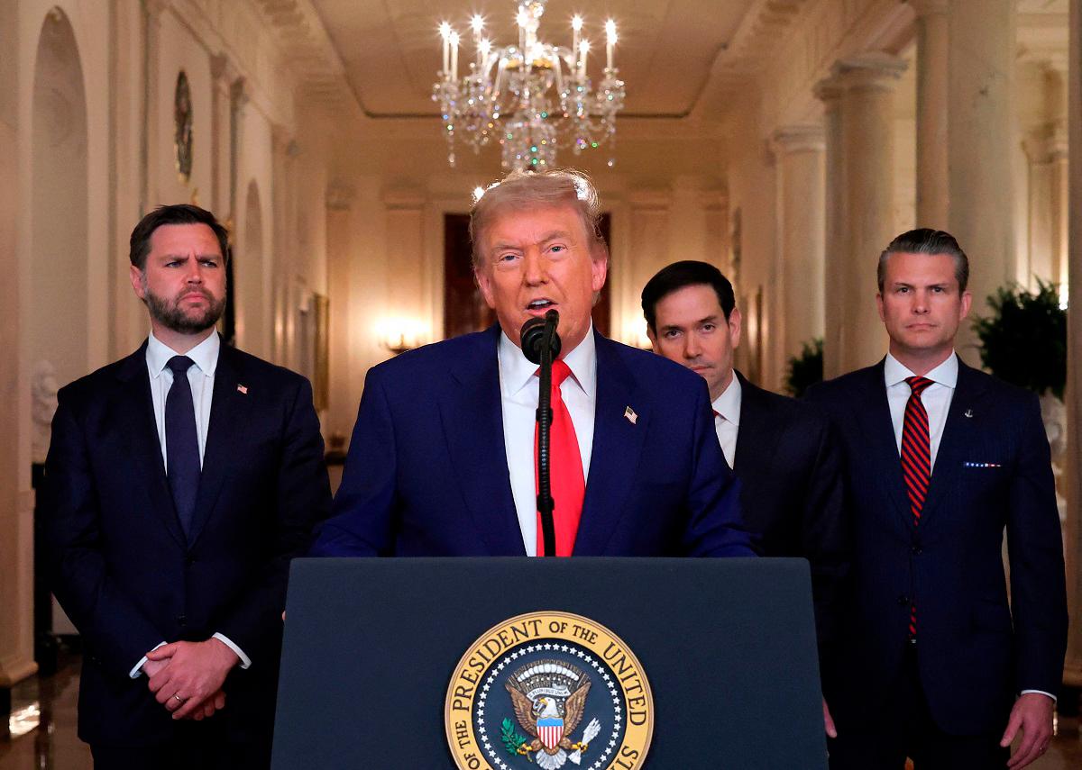 US President Donald Trump addresses the nation, alongside US Vice President JD Vance (L), US Secretary of State Marco Rubio (2nd R) and US Secretary of Defense Pete Hegseth (R), from the White House in Washington, DC on June 21, 2025, following the announcement that the US bombed nuclear sites in Iran. President Donald Trump said June 21, 2025 the US military has carried out a “very successful attack” on three Iranian nuclear sites, including the underground uranium enrichment facility at Fordo. “We have completed our very successful attack on the three Nuclear sites in Iran, including Fordow, Natanz, and Esfahan,“ Trump said in a post on his Truth Social platform. - CARLOS BARRIA / POOL / AFP