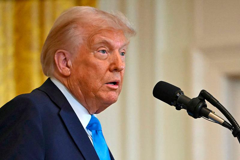 US President Donald Trump speaks at a press conference with unseen Israel's Prime Minister Benjamin Netanyahu in the East Room of the White House in Washington, DC, on February 4, 2025. Netanyahu met Trump at the White House Tuesday for crucial talks on the truce with Hamas, as the US president suggested permanently resettling Palestinians from war-battered Gaza. - ANDREW CABALLERO-REYNOLDS / AFP