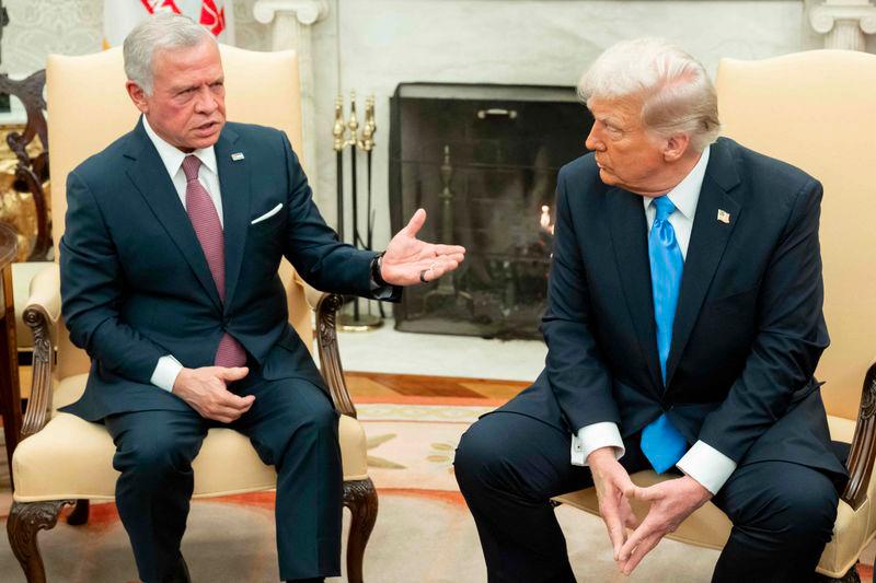 US President Donald Trump (R) meets with King Abdullah II of Jordan during a meeting in the Oval Office of the White House in Washington, DC, on February 11, 2025. - AFPPIX