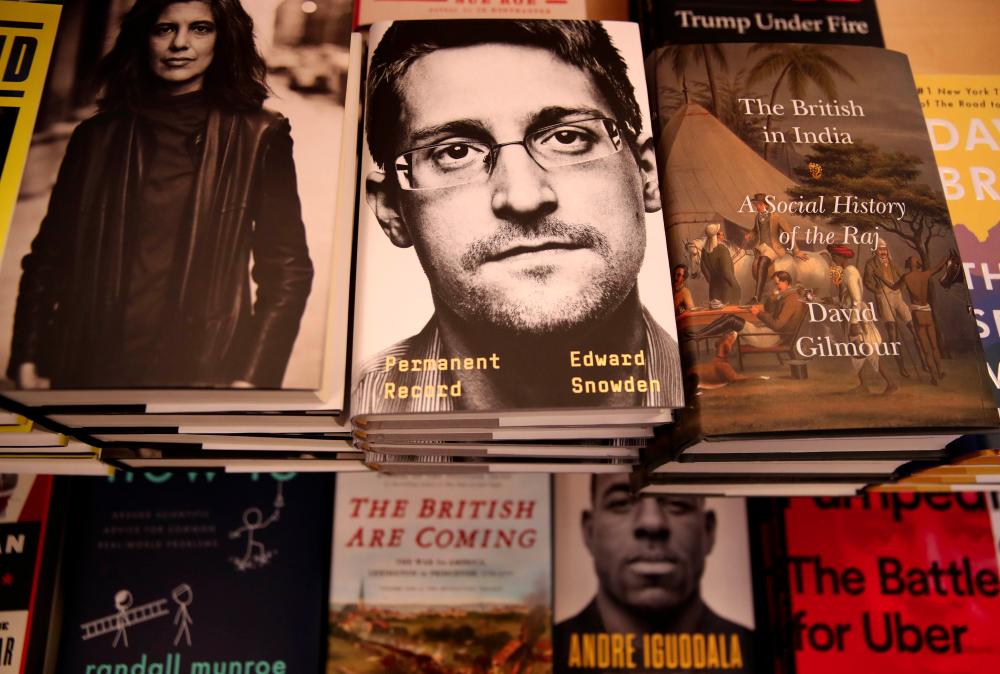 Newly released “Permanent Record” by Edward Snowden is displayed on a shelf at Books Inc. on September 17, 2019 in San Francisco, California. — AFP