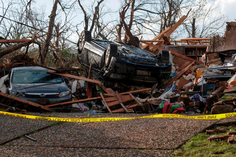 LITTLE ROCK, AR - MARCH 31: Homes damaged by a tornado are seen on March 31, 2023 in Little Rock, Arkansas. Tornados damaged hundreds of homes and buildings Friday afternoon across a large part of Central Arkansas. AFPPIX