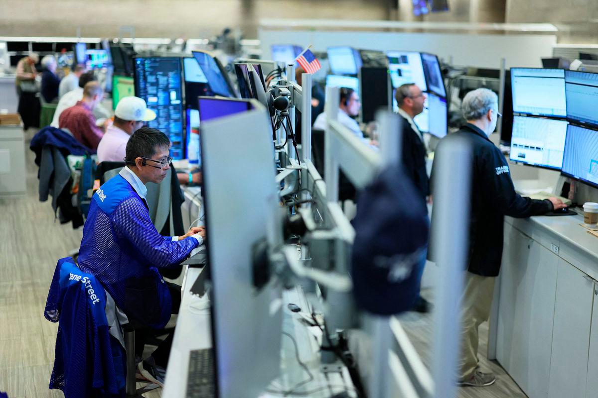 Traders work on the floor of the New York Stock Exchange on July 08, 2025 in New York City. (Photo by Michael M. Santiago / GETTY IMAGES NORTH AMERICA / AFP)