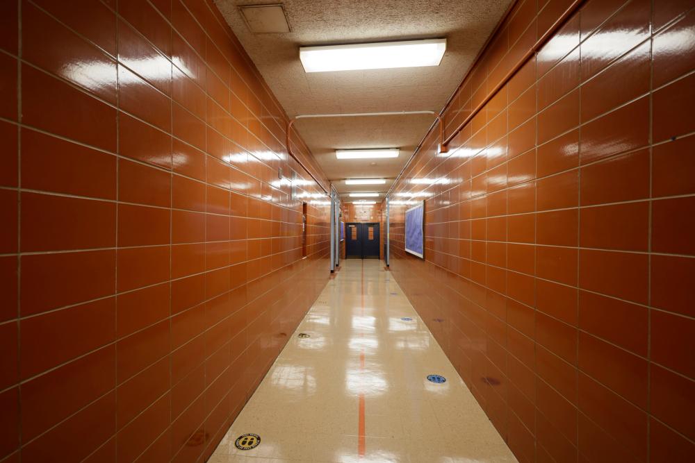 A hallway is seen empty during a day of school portrait shoots at Sun Yat Sen M.S. –AFP