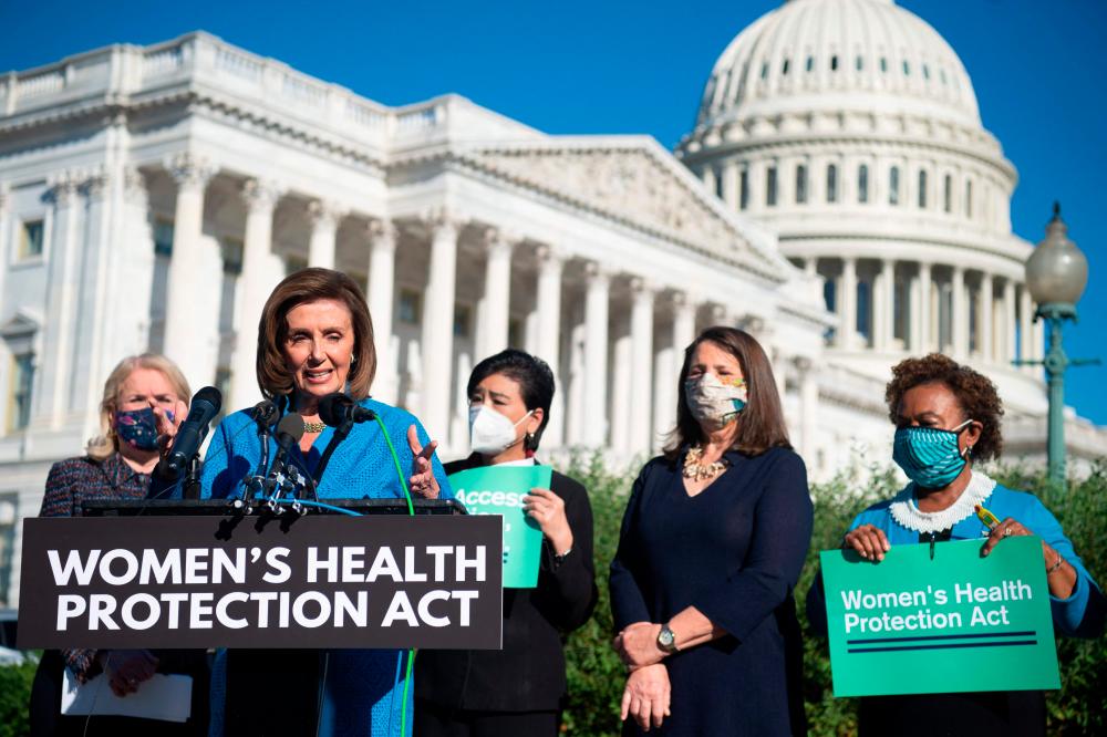 US Speaker of the House Nancy Pelosi, Democrat of California, joins House Democrats at a news conference on the “Women’s Health Protection Act,“ on September 24, 2021, outside the US Capitol in Washington DC. AFPpix