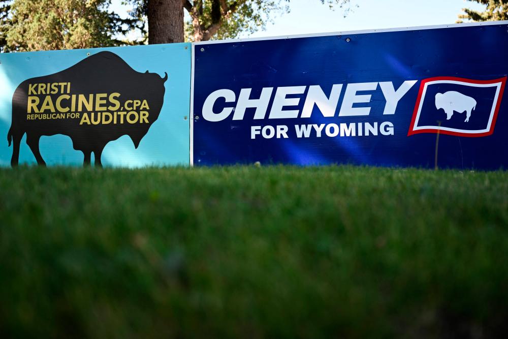 A yard sign in support of US Representative Liz Cheney (R-WY) is displayed in Laramie, Wyoming, on August 13, 2022, ahead of the Wyoming Republican primary election. In Wyoming, Donald Trump still reigns supreme. - AFPPIX