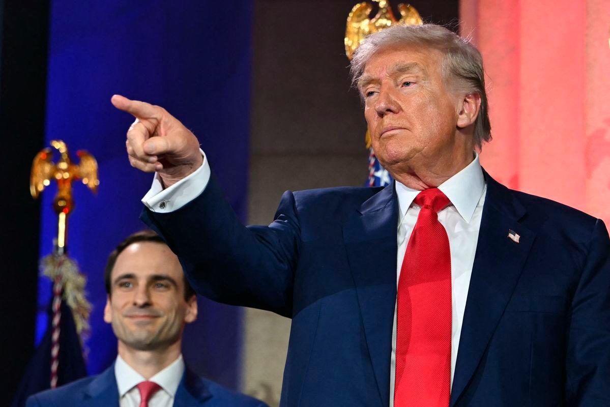 US President Donald Trump gestures after signing an executive order on artificial intelligence at the “Winning the AI Race” AI Summit at the Andrew W. Mellon Auditorium in Washington, DC - AFPPix