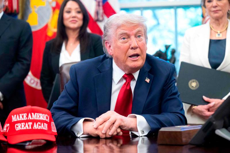 Trump speaks to the media after signing executive orders relating to higher education institutions in the Oval Office of the White House in Washington, DC, on April 23, 2025. AFPpix