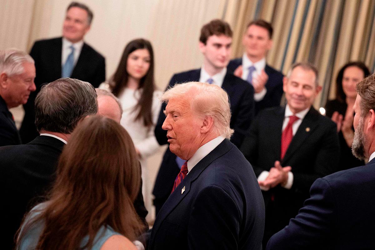 US President Donald Trump arrives during a dinner for Republican US Senators in the State Dining Room of the White House July 18, 2025, in Washington, DC. - AFP