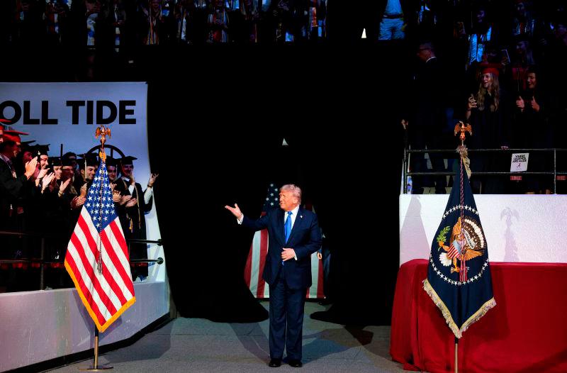 U.S. President Donald Trump arrives to deliver remarks to graduating students at the Coleman Coliseum at the University of Alabama on May 01, 2025 in Tuscaloosa, Alabama. AFPpix