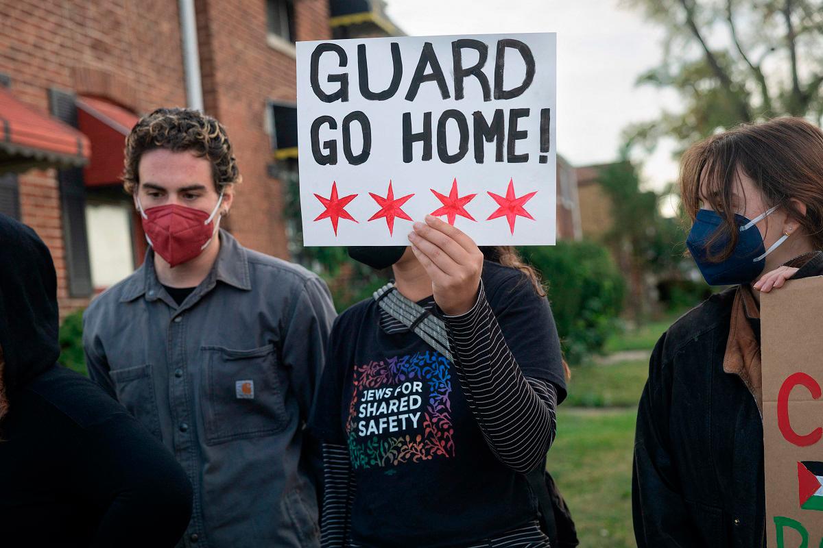 Demonstrators protest near the immigration processing and detention facility on October 10, 2025 in Broadview, Illinois. Demonstrations have been taking place outside of the facility for several weeks as the Trump administration’s Operation Midway Blitz has been underway, arresting and detaining immigrants in the Chicago area. - Getty Images/AFP