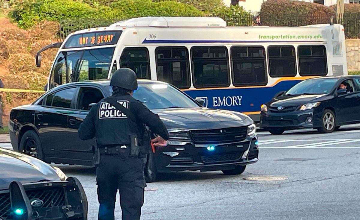 Atlanta Police lock down the streets around the Center for Disease Control (CDC) during an active shooter event in Atlanta, Georgia on August 8, 2025. On August 8, 2025, a suspect armed with multiple firearms opened fire near Emory University and the CDC in Atlanta, Georgia. A police officer was injured and the shooter is dead. - Photo by John Falchetto / AFP