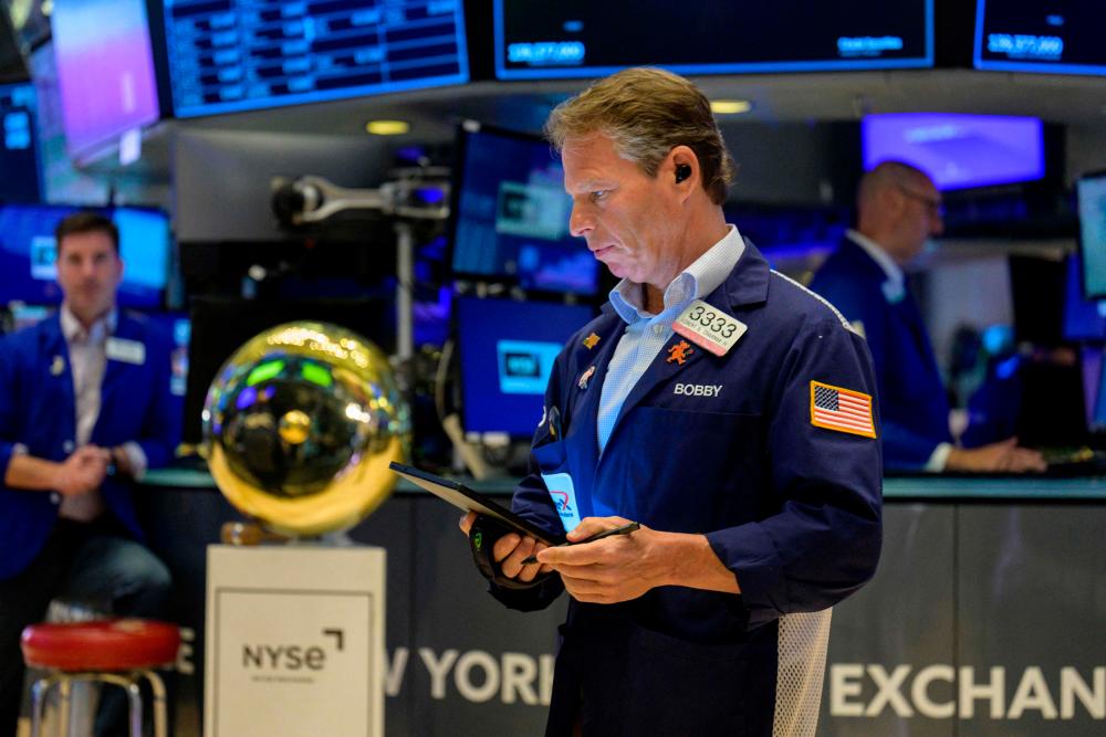 Traders working on the floor at the New York Stock Exchange. Nvidia’s stock surge on Wednesday May 24, 2023, extends the Silicon Valley company’s lead as the world’s most valuable chipmaker and Wall Street’s fifth-most valuable company. – AFPpic