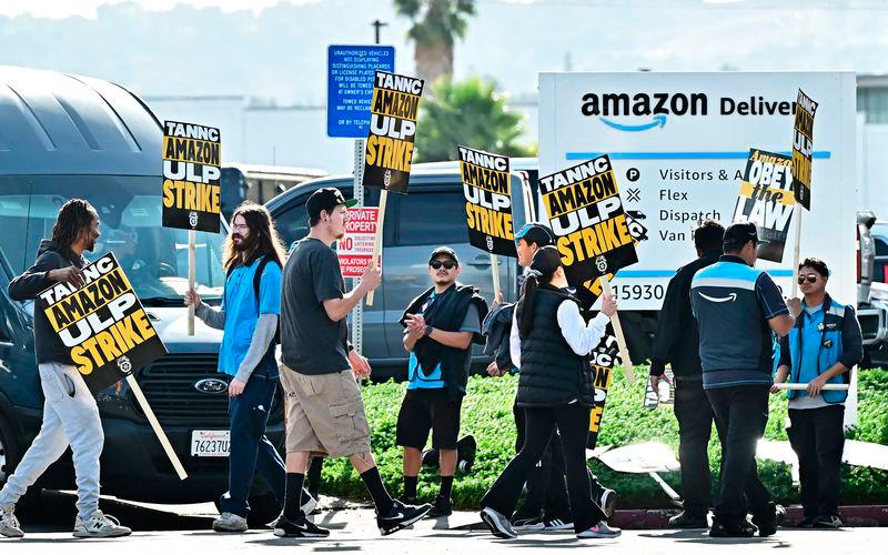 Amazon workers walk the picket line outside an Amazon facility in the City of Industry, California on December 19, 2024. AFPpix