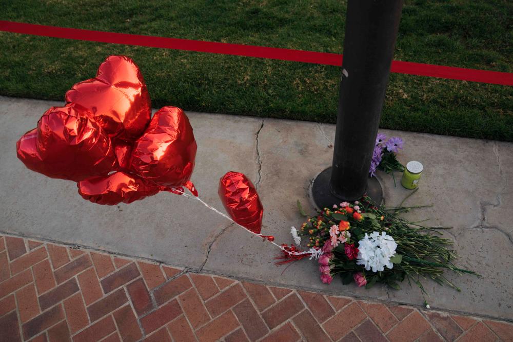 MONTEREY PARK, CA - JANUARY 22: A makeshift memorial at Monterey Park City Hall for victims of a deadly shooting on January 22, 2023 in Monterey Park, California. AFPPIX
