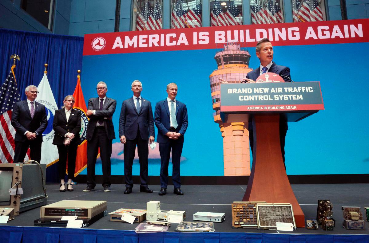U.S. Secretary of Transportation Sean Duffy (R) speaks alongside airline executives, including (2ndR-L) CEO of United Airlines Scott Kirby, Robert Isom CEO of American Airlines, Ed Bastian CEO of Delta Air Lines, Joanna Geraghty CEO of JetBlue and Robert Jordan CEO of Southwest Airlines, at an event unveiling a new U.S. air traffic control system at the Department of Transportation on May 08, 2025 in Washington, DC. AFPpix