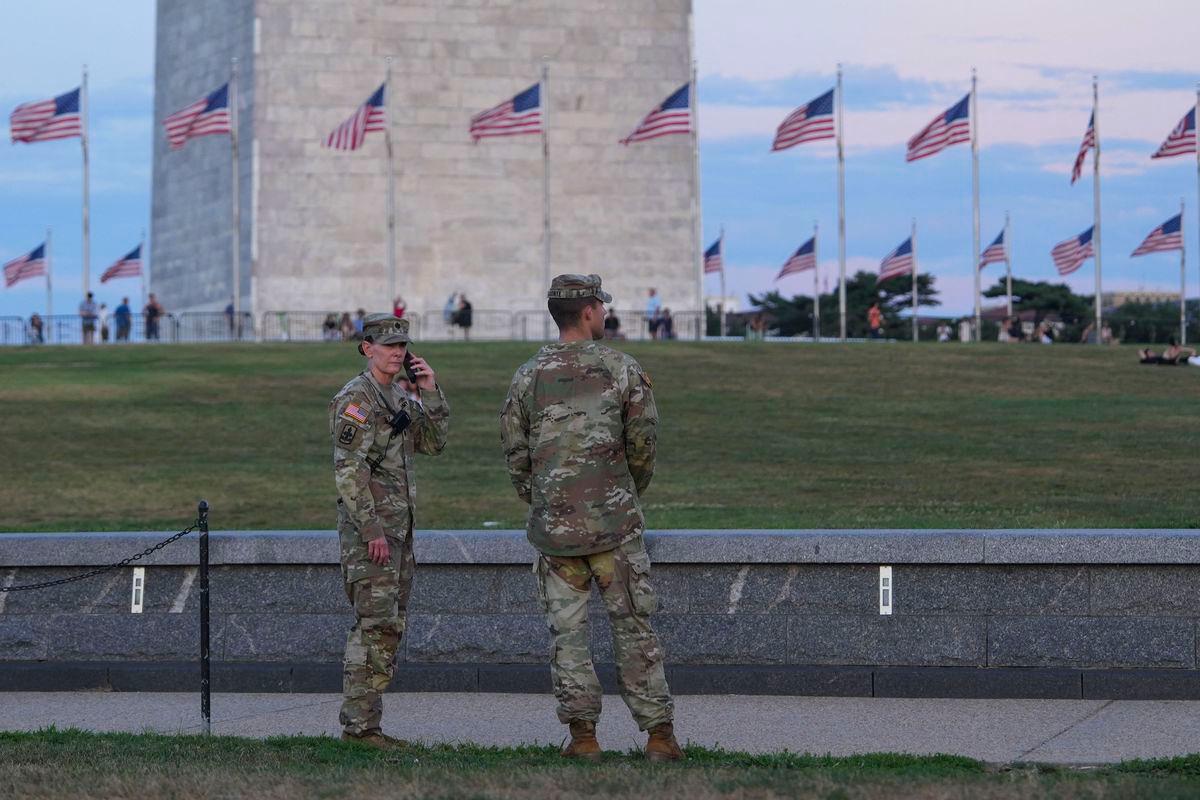 National Guard troops walk along the National Mall on August 8, 2025 in Washington, DC. GETTY IMAGES NORTH AMERICA / AFPPix