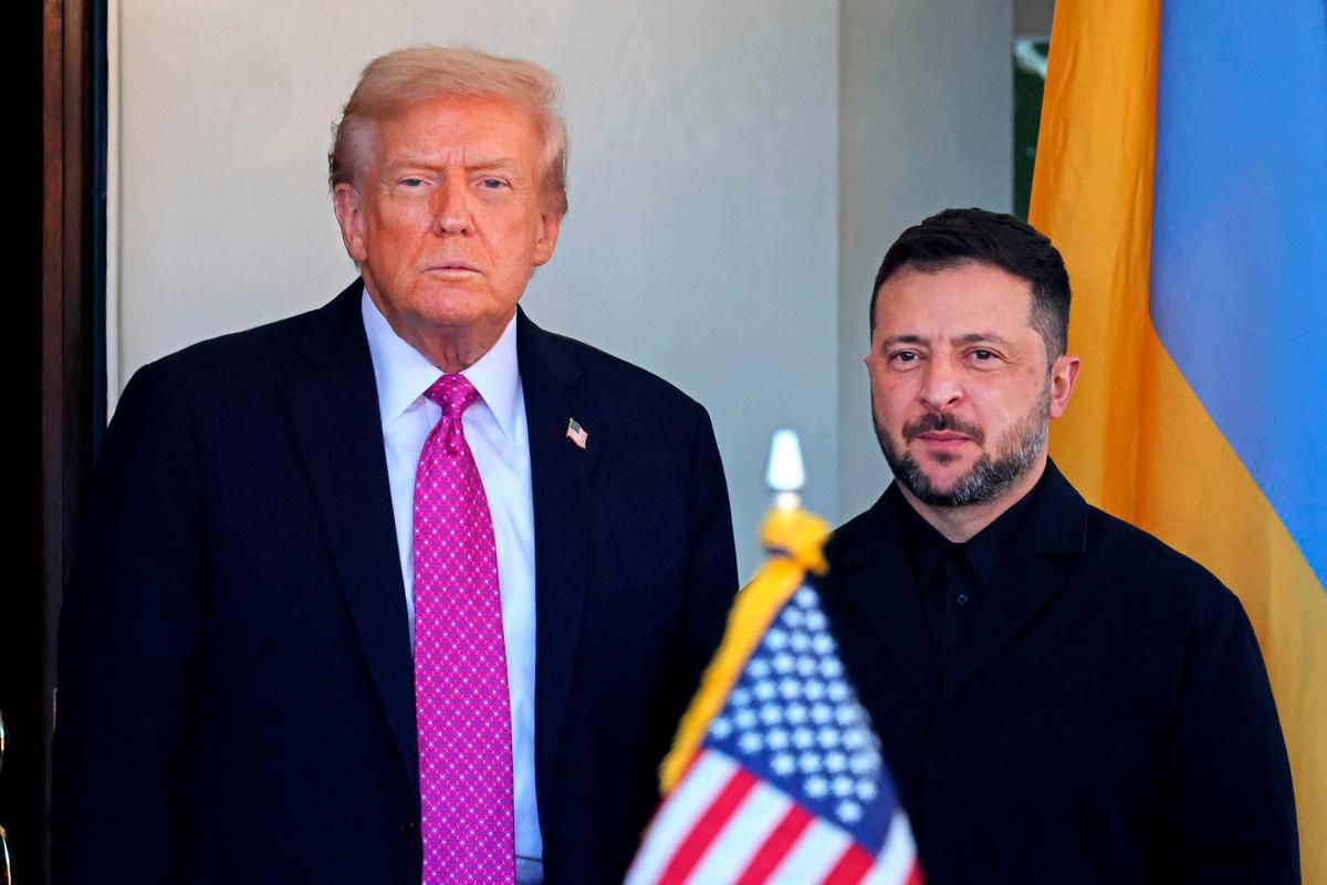 US President Donald Trump welcomes Ukrainian President Volodymyr Zelensky as he arrives for a meeting at the White House in Washington, DC, on October 17, 2025. (Photo by TOM BRENNER / AFP)