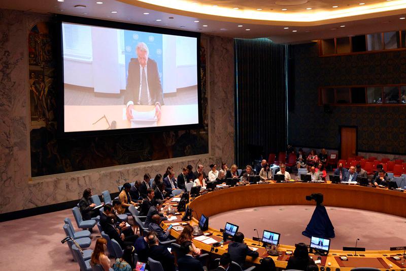 Members of the United Nations Security Council listen as Tor Wennesland, United Nations Special Coordinator for the Middle East Peace Process, speaks during a meeting on the situation in the Middle East, including the Palestinian question at U.N. headquarters on September 19, 2024 in New York City. The Security Council held a meeting on the ongoing war between Israel and Hamas in Gaza that has escalated tensions in the region. Algeria requested the meeting on behalf of the Arab states due to two waves of Israeli attacks using exploding pagers and walkie-talkies in Lebanon that targeted the militant group Hezbollah. At least 37 people have been killed, and over 200 people seriously wounded. - Michael M. Santiago/Getty Images/AFP