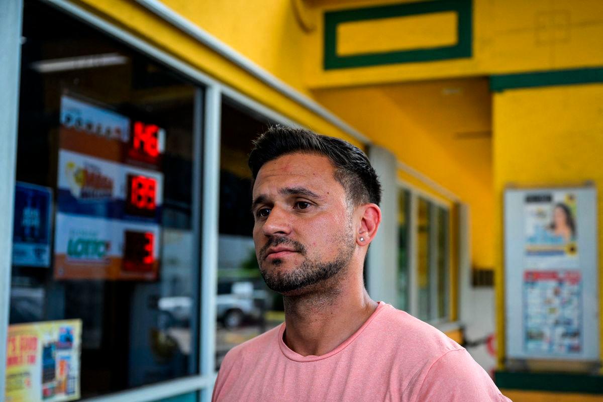 Denis Caldeira looks on as he speaks during an AFP interview outside a Venzuelan food mart in Doral, Florida, May 20, 2025.