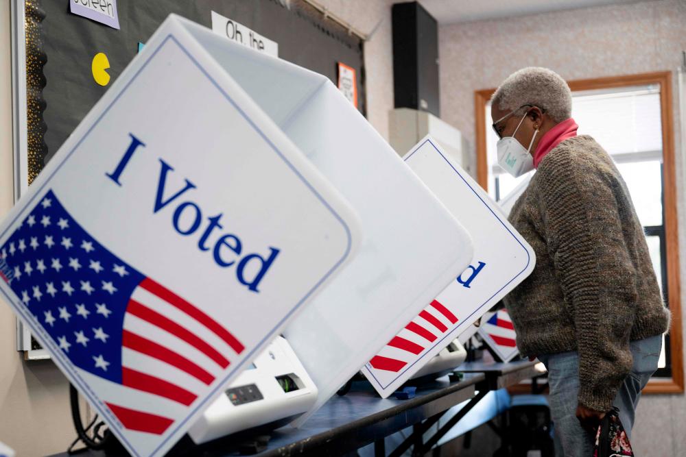A woman votes at a polling location in Stiles Point Elementary in Charleston, South Carolina, on February 3, 2024. - AFPPIX