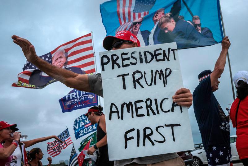 Supporters of former US President and Republican presidential candidate Donald Trump show their support on Election Day - REUTERSpix