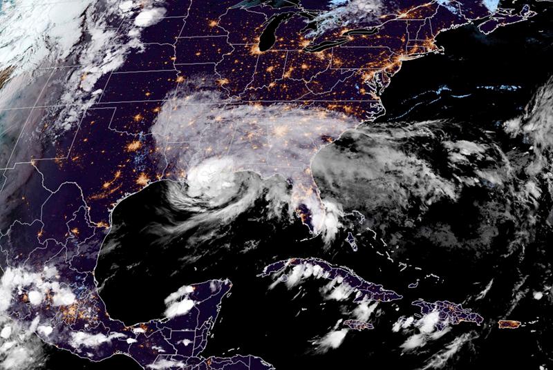 This handout picture courtesy of NOAA/RAAMB (National Oceanic and Atmospheric Administration / Regional and Mesoscale Meteorology Branch) taken at 8:20PM EST shows hurricane Francine over Louisiana on September 12, 2024. Hurricane Francine barreled into Louisiana on September 11, forecasters said, warning of life-threatening flooding and storm surge as residents of the southern US state rushed to board up businesses and stockpile emergency supplies.The Category 2 storm made landfall in Terrebonne Parish on the southern edge of the state at 5:00 pm local time (2200 GMT), according to the National Hurricane Center (NHC).Francine was packing sustained winds of 100 miles (155 kilometers) per hour and could bring up to 10 feet of storm surge and 12 inches of rain in some parts of Louisiana, the NHC added. - AFP PHOTO / NOAA / RAAMB