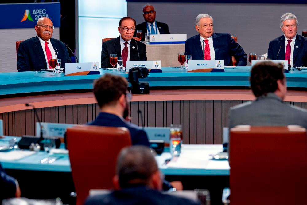 Prime Minister Datuk Seri Anwar Ibrahim (second, left) during APEC Economic Leaders’ Informal Dialogue and Working Lunch here on Nov 16 2023. - BERNAMAPIX