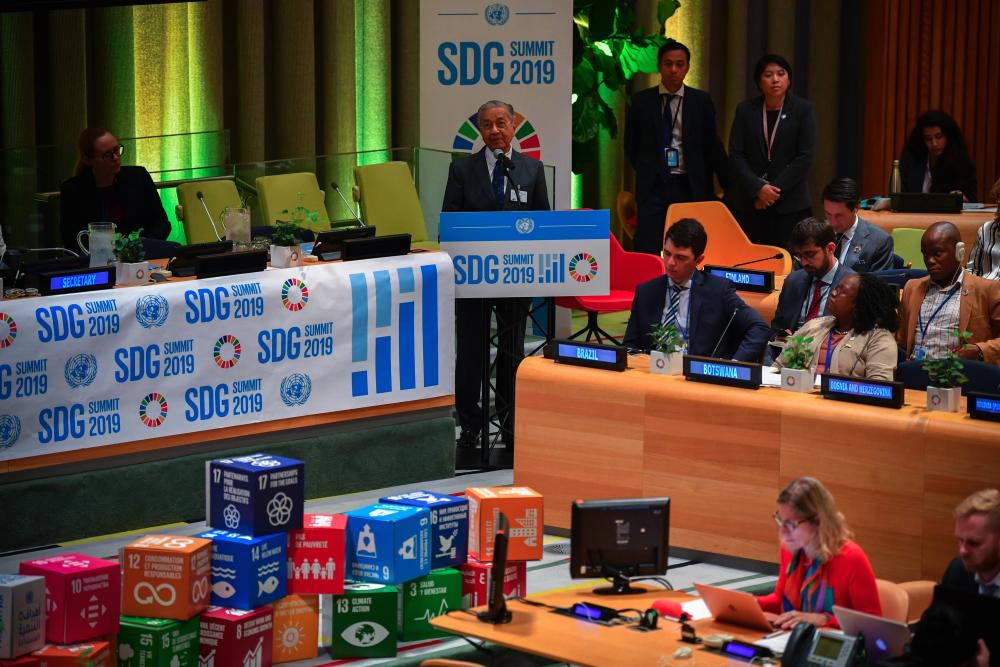 Prime Minister Tun Dr Mahathir Mohamad speaks at the SDG Summit - Leaders Dialogue 6 on 'The 2020-2030 Vision', at the UN headquarters in New York on Wednesday, Sept 25, 2019. - Bernama