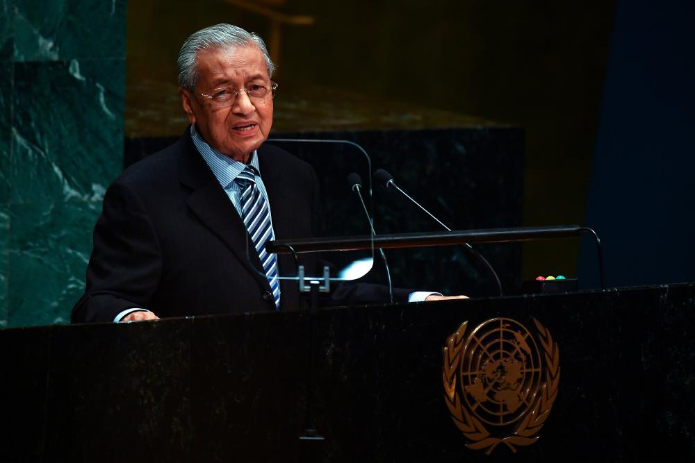 Prime Minister Tun Dr Mahathir Mohamad delivers his statement at the General Debate of the 74th Session of the United Nations General Assembly at the UN headquarters in New York on Friday, Sept 27, 2019. - Bernama