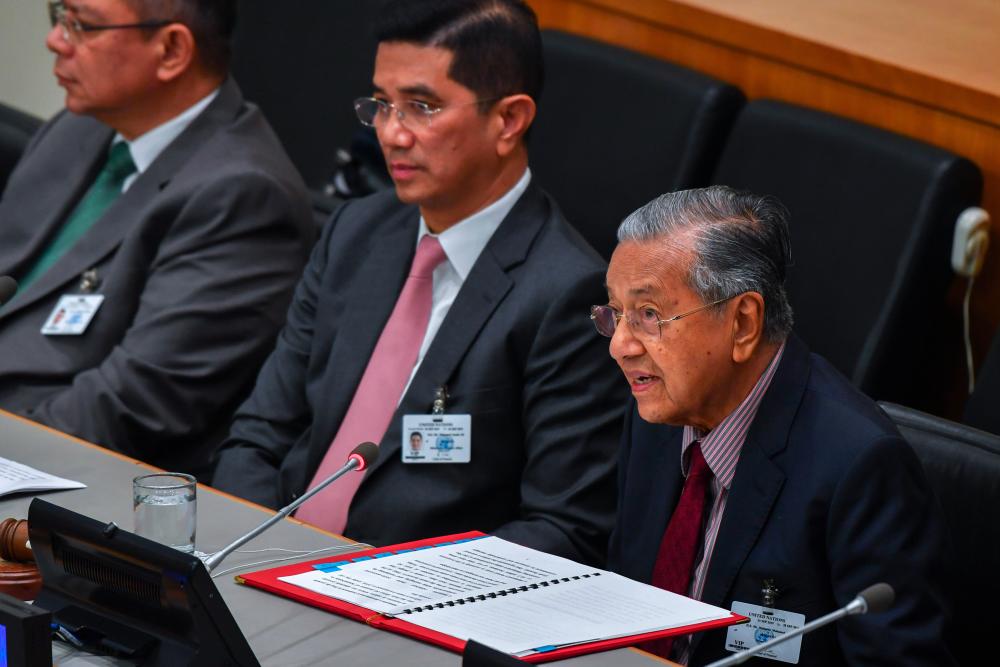 Prime Minister Tun Dr Mahathir Mohamad addresses the ‘Environmental Stewardship in Addressing Poverty to Achieve Sustainable Development for All’, a side event of the United Nations General Assembly (UNGA), at the UN headquarters in New York, on Thursday.  - Bernama