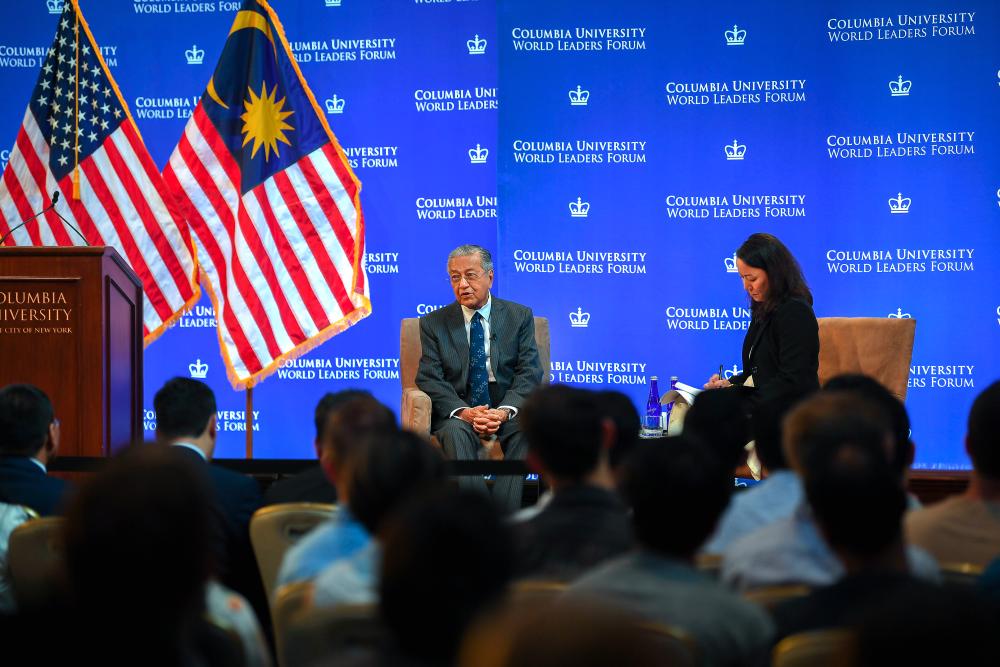 Prime Minister Tun Dr Mahathir Mohamad speaks at the World Leaders Forum held at Columbia University, New York City, on Wednesday, Sept 25, 2019. - Bernama