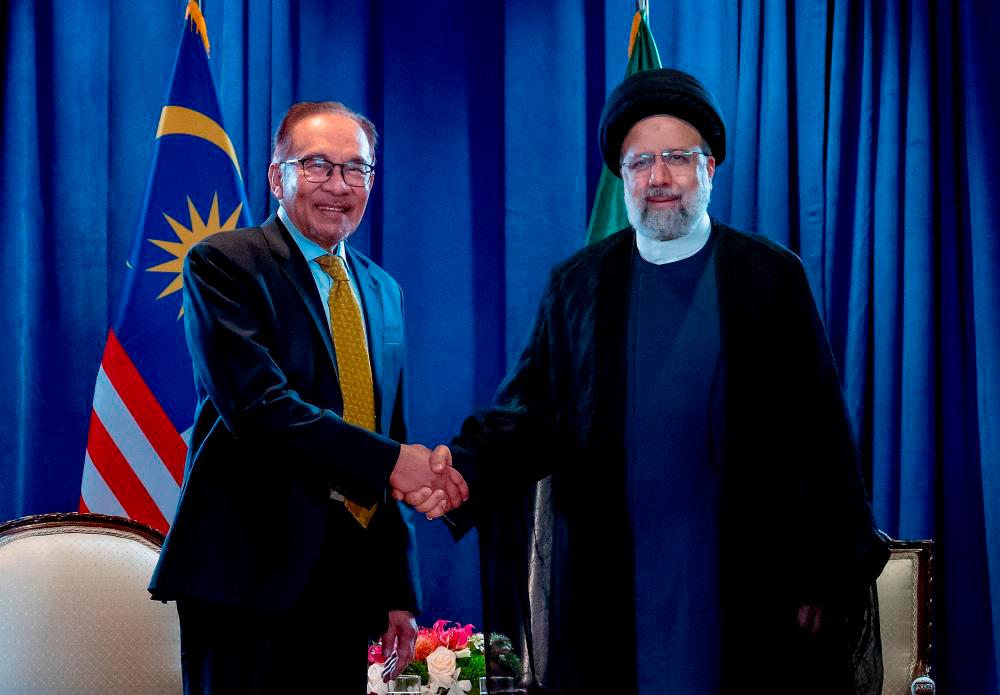 Prime Minister Datuk Seri Anwar Ibrahim with Iranian President Ebrahim Raisi - BERNAMApix