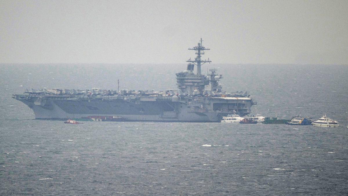 A general view of US aircraft carrier USS George Washington (CVN-73) shortly after berthing at Manila Bay in Manila on July 3, 2025. (Photo by Ted ALJIBE / AFP)