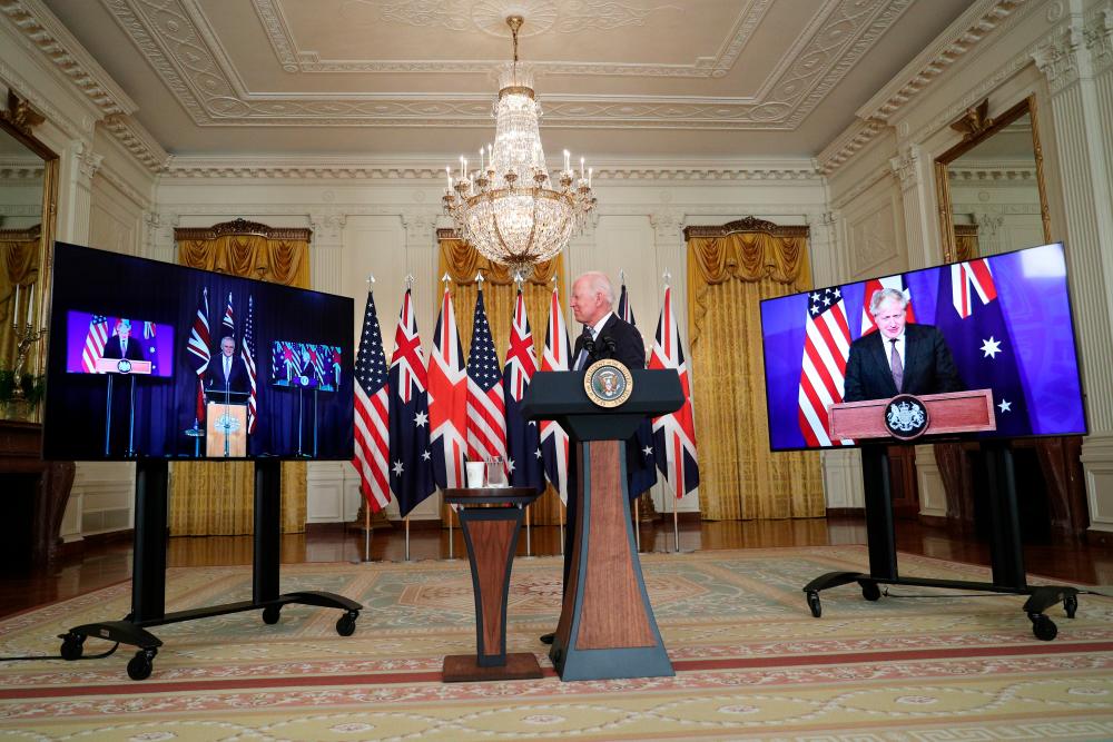 US President Joe Biden delivers remarks on a National Security Initiative virtually with Australian Prime Minister Scott Morrison and British Prime Minister Boris Johnson, inside the East Room at the White House in Washington, U.S., September 15, 2021. -REUTERSPix