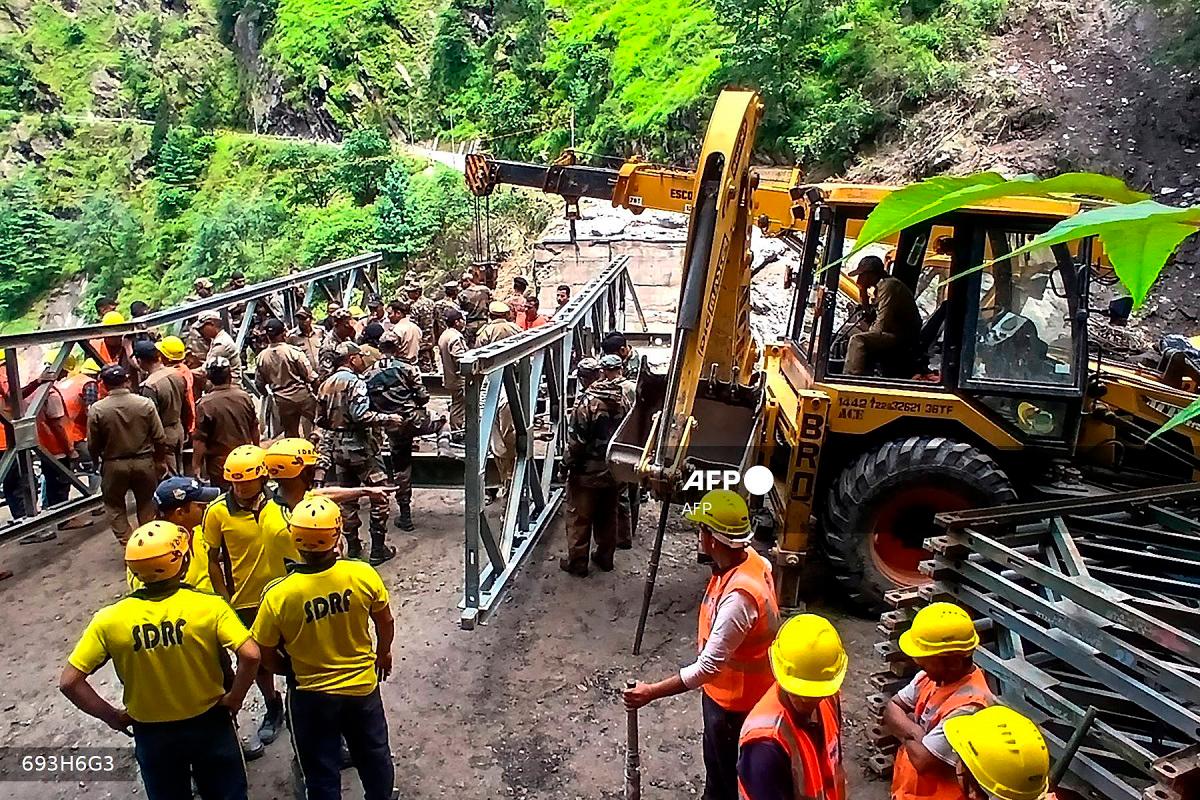Army and rescue personnel construct a bailey bridge near the Bhatwari village in the Uttarkashi district on August 8, 2025, following a cloudburst that caused a massive mudslide and flash floods in India's Uttarakhand state. - AFPpix