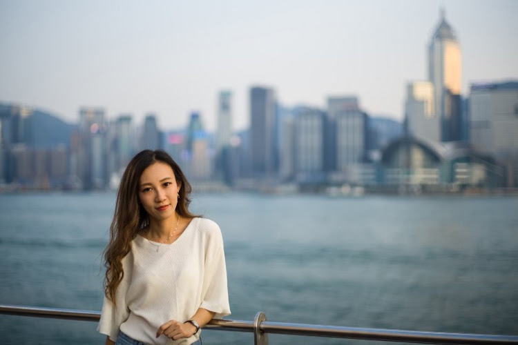 This picture taken on Oct 3, 2018 shows Hong Kong-based flight attendant Venus Fung, who works for a European airline, posing during an interview with AFP in Hong Kong. — AFP