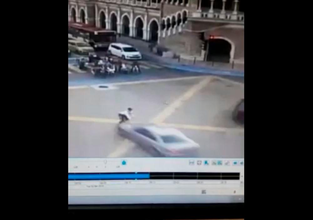 (Video) Student rams into policeman on duty