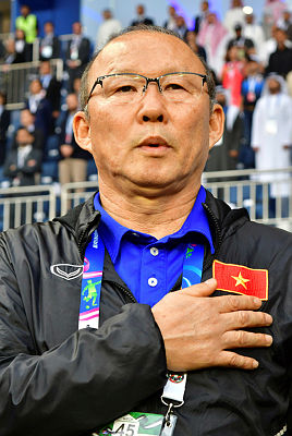 Vietnam’s coach Hang-Seo Park sings the national anthem during the 2019 AFC Asian Cup quarter-final football match between Vietnam and Japan at the Al-Maktoum Stadium in Dubai. — AFP
