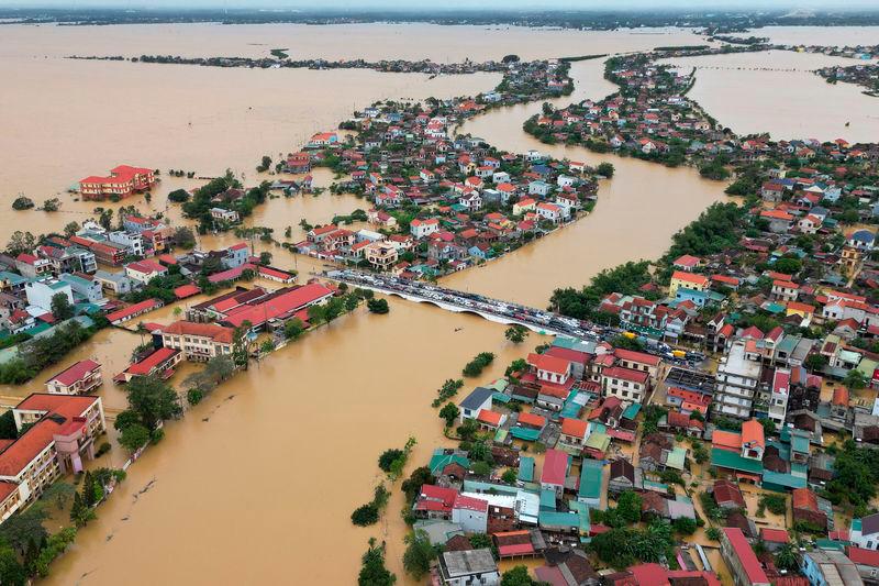 Flash flooding in central Vietnam killed five people, damaged hundreds of homes and destroyed crops - AFPpix